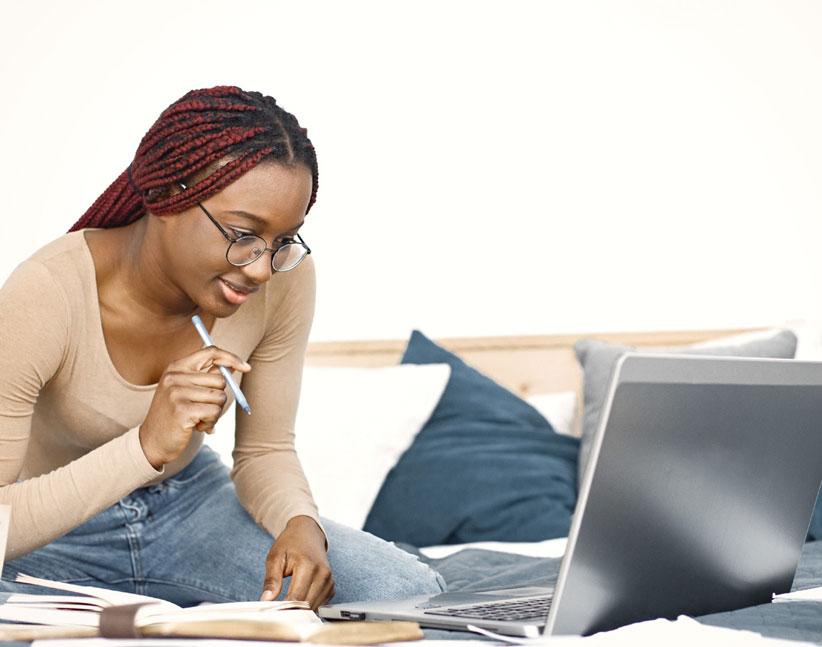 Person studying with a computer Person studying with a computer